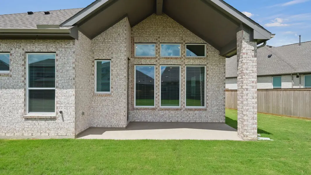 Exterior details and patio area of a home in Lariat, Liberty Hill (Image 4). Exterior details and patio area of a home in Lariat, Liberty Hill (Image 4).