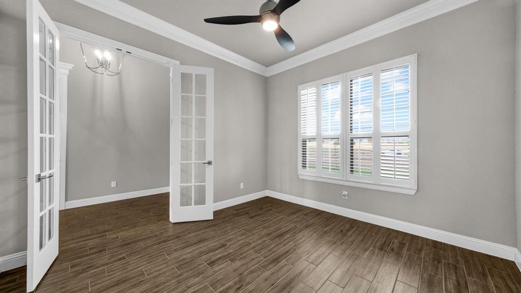 Study or Formal Dining Room with French Doors, dark hardwood / wood-style flooring, and french doors