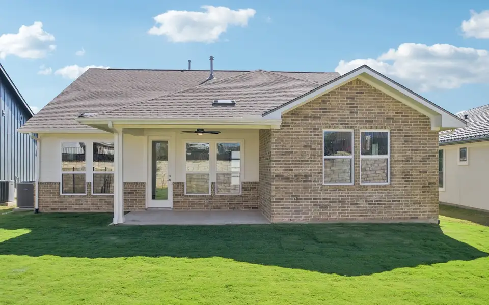 Exterior details and patio area of a home in Traditional at Kissing Tree, San Marcos (Image 3).