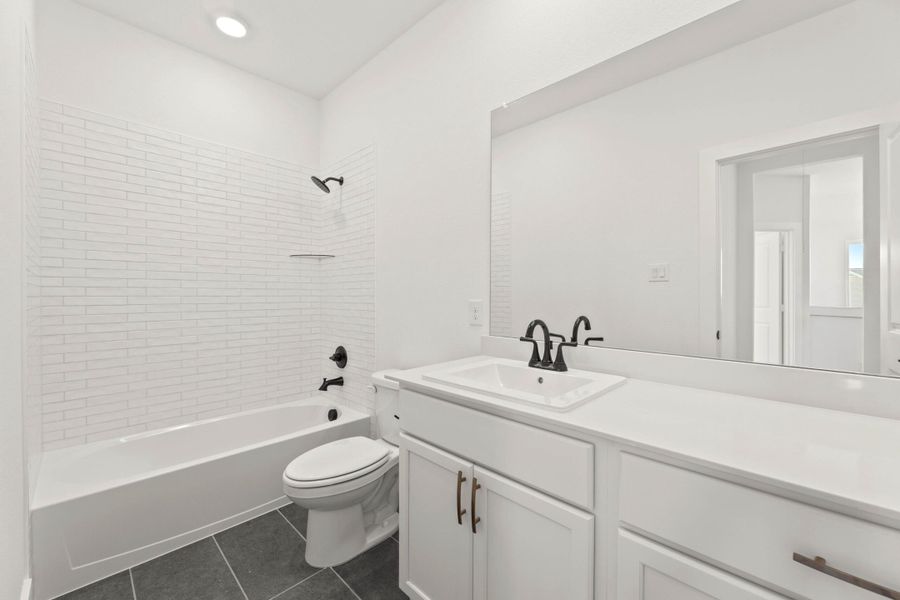 Furnished interior view inside a new home in Terrace Collection at Harvest, Argyle (Image 10).