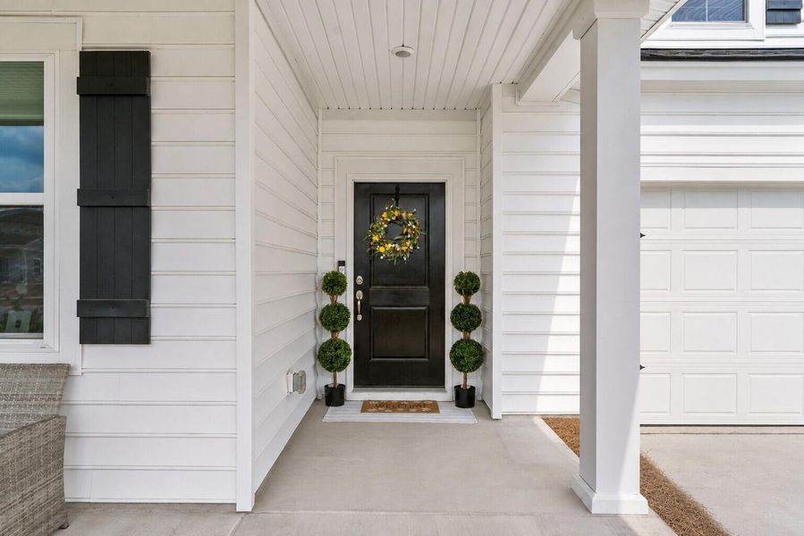 Exterior details and patio area of a home in Lindera Preserve at Cane Bay Plantation, Summerville (Image 26). Exterior details and patio area of a home in Lindera Preserve at Cane Bay Plantation, Summerville (Image 26).