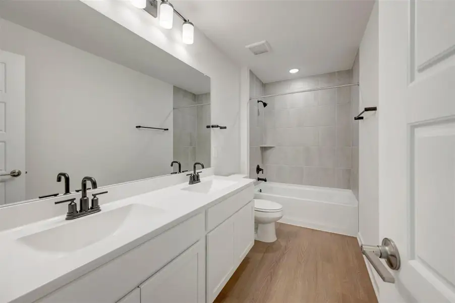 Furnished interior view inside a new home in Sorella, Tomball (Image 15).