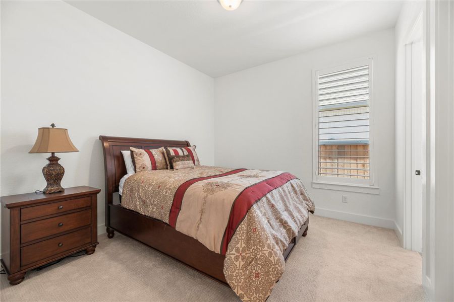 Furnished interior view inside a new home in Bridgeland, Cypress (Image 35).