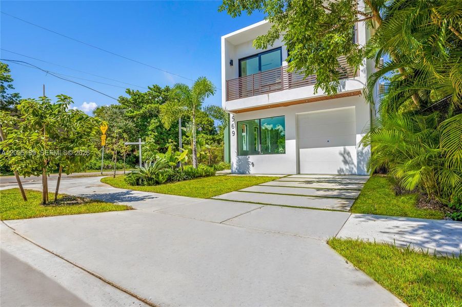 Front exterior of a new home in , Miami, FL, highlighting curb appeal (Image 2). Front exterior of a new home in , Miami, FL, highlighting curb appeal (Image 2).