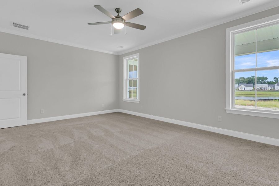 Spacious, unfurnished interior of a new home in Tidewater at Lakes of Cane Bay, Summerville (Image 26).