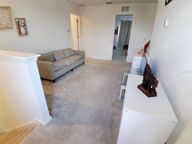 Furnished interior view inside a new home in Hunt Club Groves, Lake Wales (Image 29).