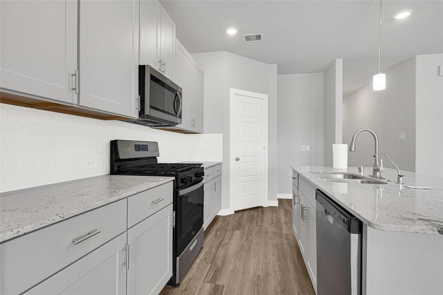 Furnished interior view inside a new home in Sundance Cove - Premier Series, Crosby (Image 6).