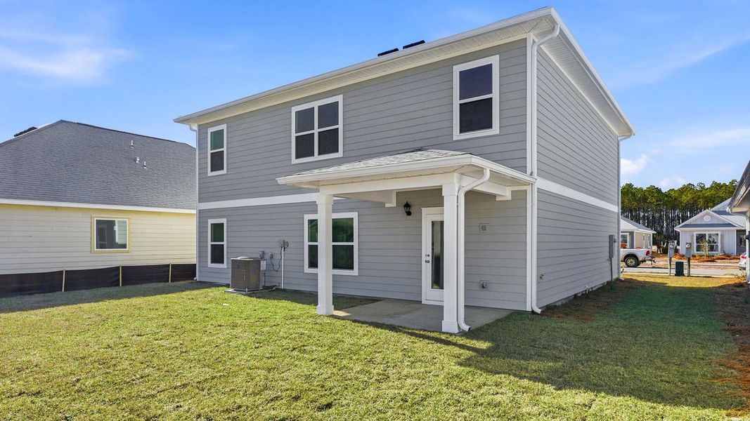 Exterior details and patio area of a home in Bayside at Ward Creek, Panama City Beach (Image 2). Exterior details and patio area of a home in Bayside at Ward Creek, Panama City Beach (Image 2).