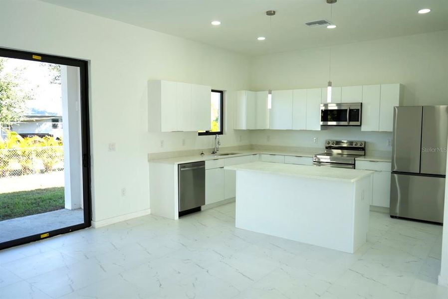 Furnished interior view inside a new home in , Cape Coral (Image 3).