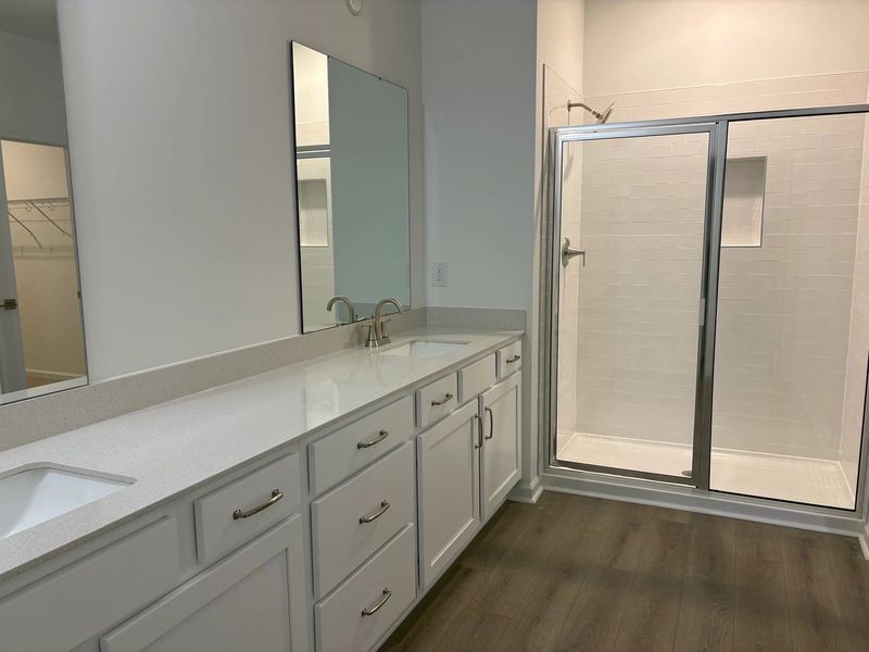 Primary Bath featuring the AW Collection® Timeless - Clean lines and graceful, polished details.