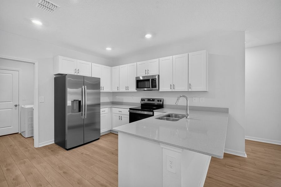 Furnished interior view inside a new home in Palm Wind, Hudson (Image 3).