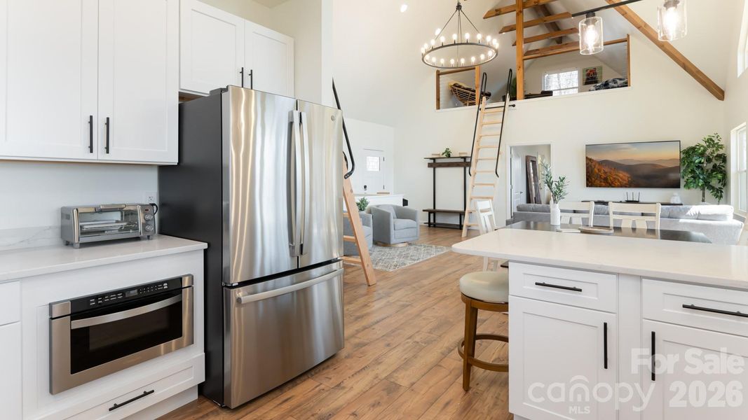 Furnished interior view inside a new home in , Waynesville (Image 8).