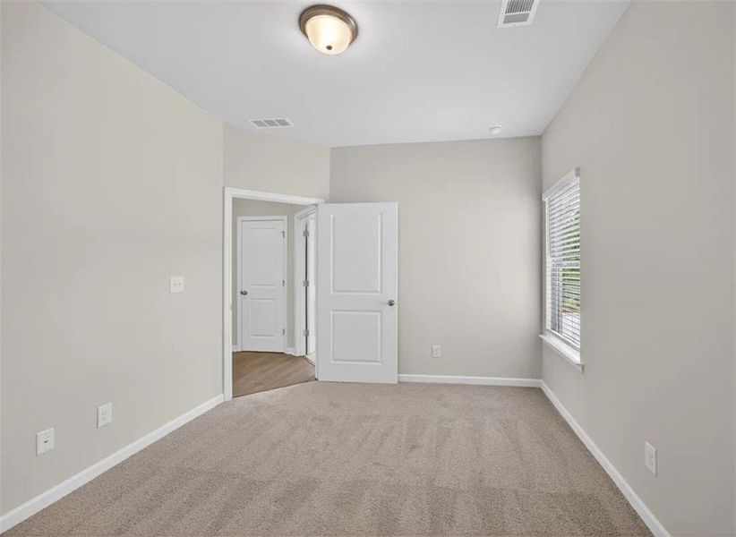 Spacious, unfurnished interior of a new home in Creekwood, Powder Springs (Image 13).