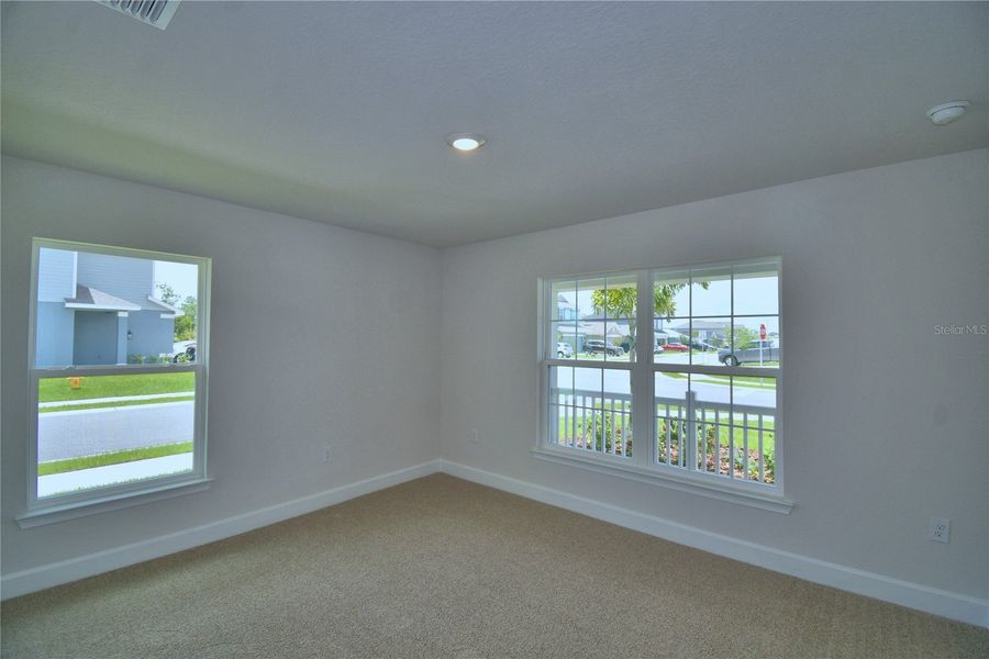 Spacious, unfurnished interior of a new home in Cadence Crossing, Auburndale (Image 19).