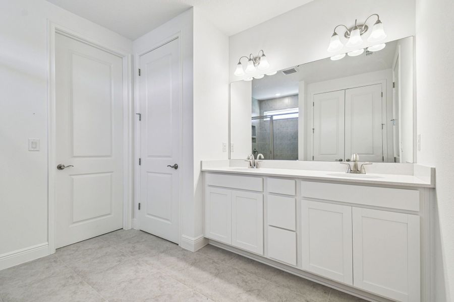 Representative furnished interior of a home built from the 50 ' - Saratoga by William Ryan Homes in Tamarack at Two Rivers, Zephyrhills (Image 8).