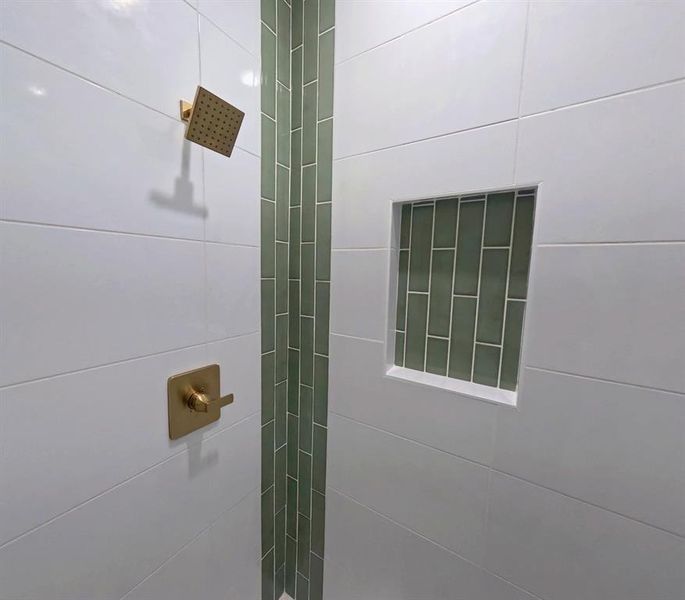 Bathroom view of a tile shower Bathroom view of a tile shower