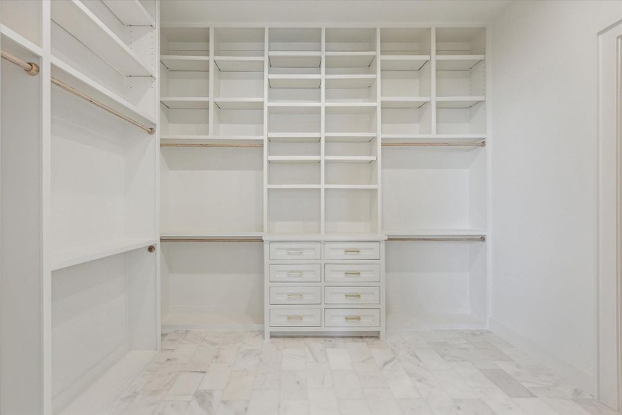 Primary closet can be customized to the buyers taste*photos are of a previously constructed home by the builder. 1527 Hewitt may have different selections at builders sole discretion. These photos are not meant to be an exact representation of 1527 Hewitt.