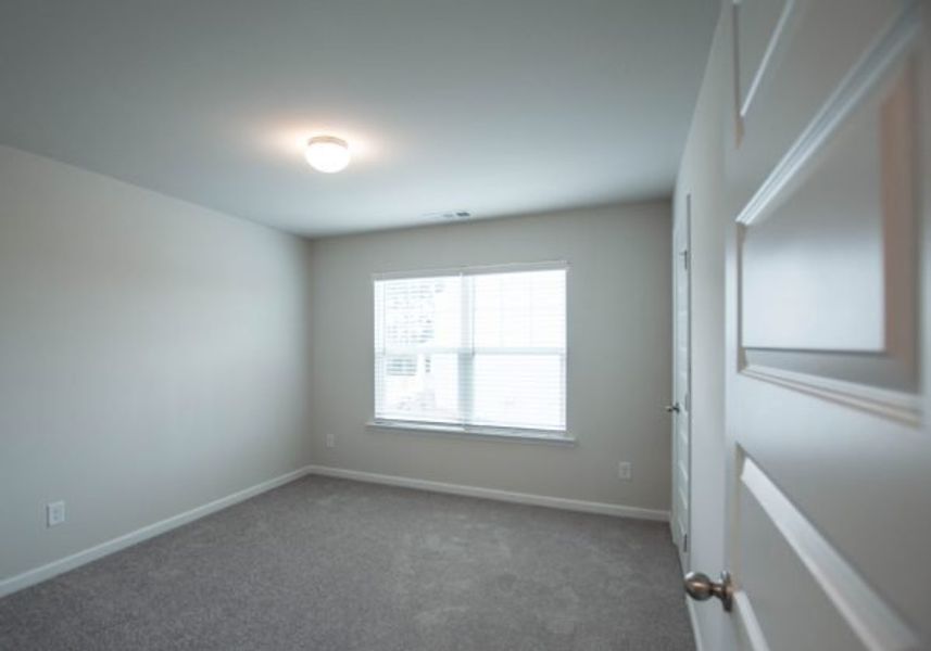 Representative unfurnished interior of a home built from the Rutherford by Piedmont Residential in Owen Preserve, Canton (Image 12).