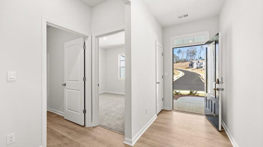 Spacious, unfurnished interior of a new home in South Wind, Fairburn (Image 30).
