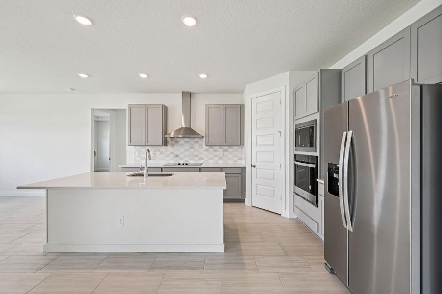 Furnished interior view inside a new home in Hampton Park - Signature Series, Vero Beach (Image 9). Furnished interior view inside a new home in Hampton Park - Signature Series, Vero Beach (Image 9).