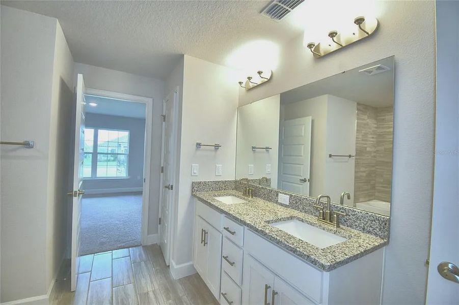 Furnished interior view inside a new home in Lake Juliana Estates, Auburndale (Image 12).