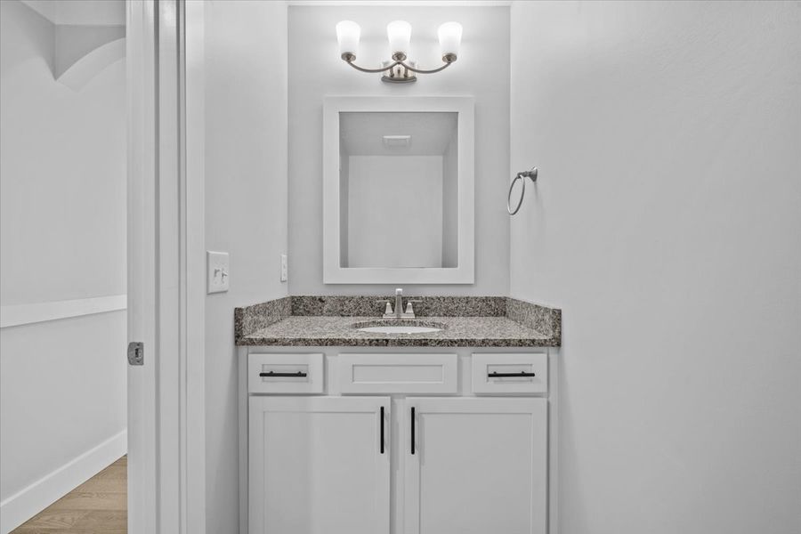 Representative furnished interior of a home built from the Hartford Elite by Enchanted Homes in Pointe Summit, Slater-Marietta (Image 18).