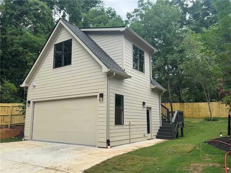 Front exterior of a new home in , Atlanta, GA, highlighting curb appeal (Image 24). Front exterior of a new home in , Atlanta, GA, highlighting curb appeal (Image 24).