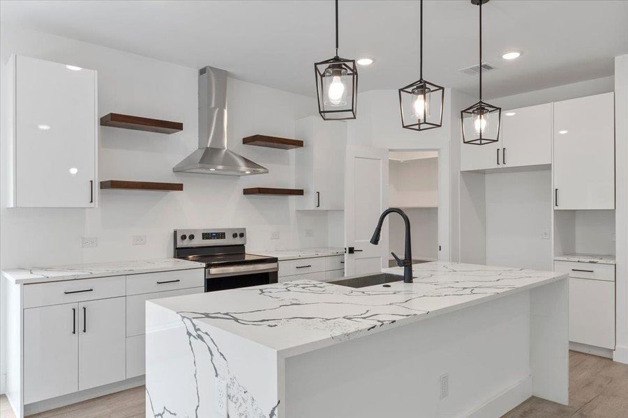 Kitchen featuring open shelves, stainless steel electric range oven, wall chimney exhaust hood, white cabinets, and recessed lighting Kitchen featuring open shelves, stainless steel electric range oven, wall chimney exhaust hood, white cabinets, and recessed lighting