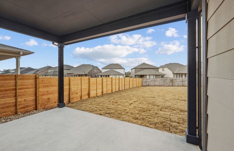 Exterior details and patio area of a home in Horizon Lake, Leander (Image 29).