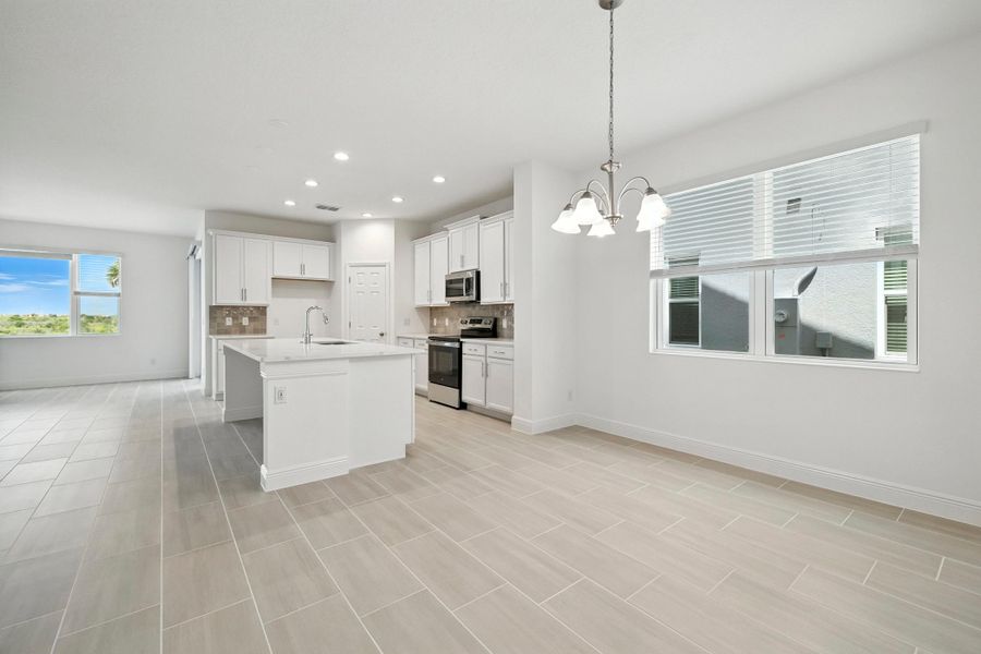 Representative furnished interior of a home built from the Wilshire Executive by Landsea Homes in Storey Creek, Kissimmee (Image 8).