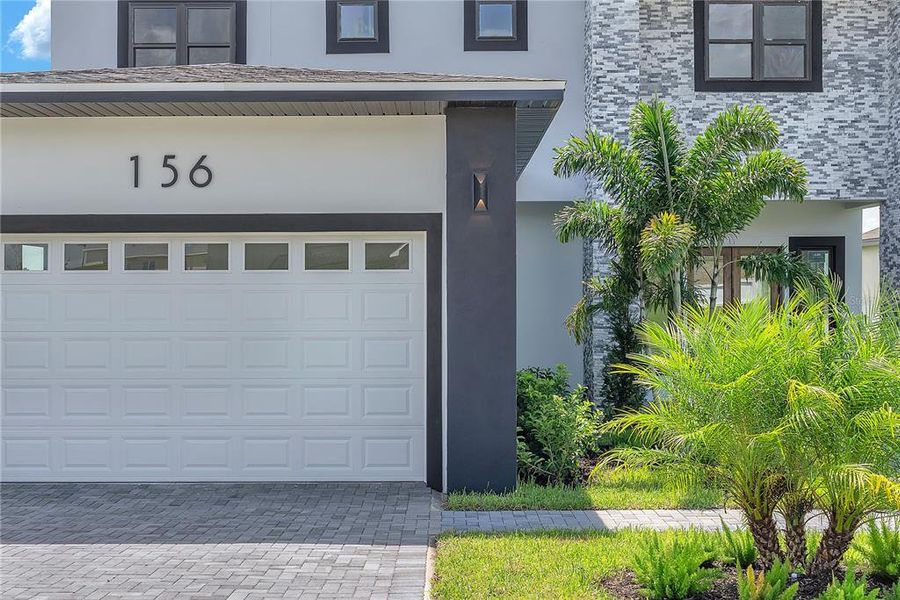 Front exterior of a new home in , Lake Alfred, FL, highlighting curb appeal (Image 21).