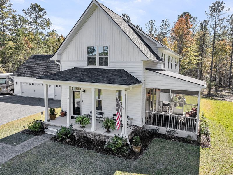 Front exterior of a new home in , Huger, SC, highlighting curb appeal (Image 21).