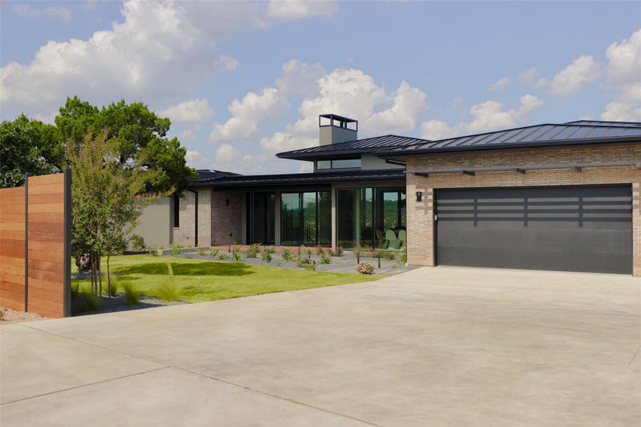 Front exterior of a new home in , Austin, TX, highlighting curb appeal (Image 20). Front exterior of a new home in , Austin, TX, highlighting curb appeal (Image 20).