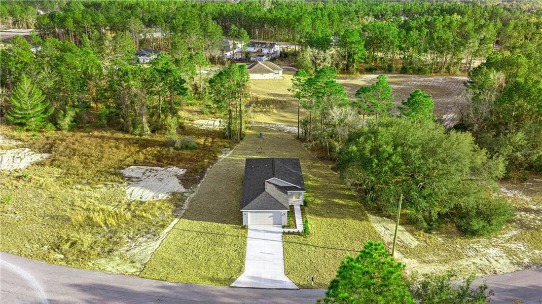 Front exterior of a new home in Marion Oaks, Ocala, FL, highlighting curb appeal (Image 5).