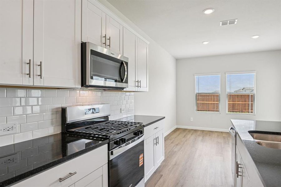 Furnished interior view inside a new home in River Ridge, Crandall (Image 13).