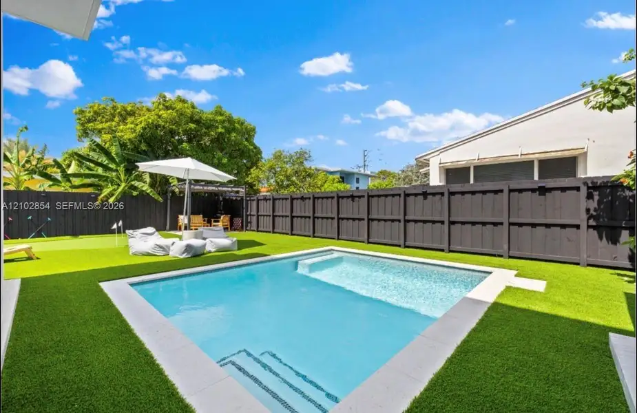 Exterior details and patio area of a home in , Miami (Image 29).