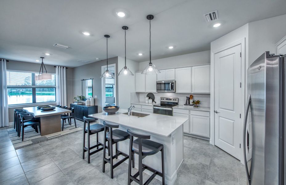 Furnished interior view inside a new home in The Strand at Cedar Grove, North Port (Image 9).