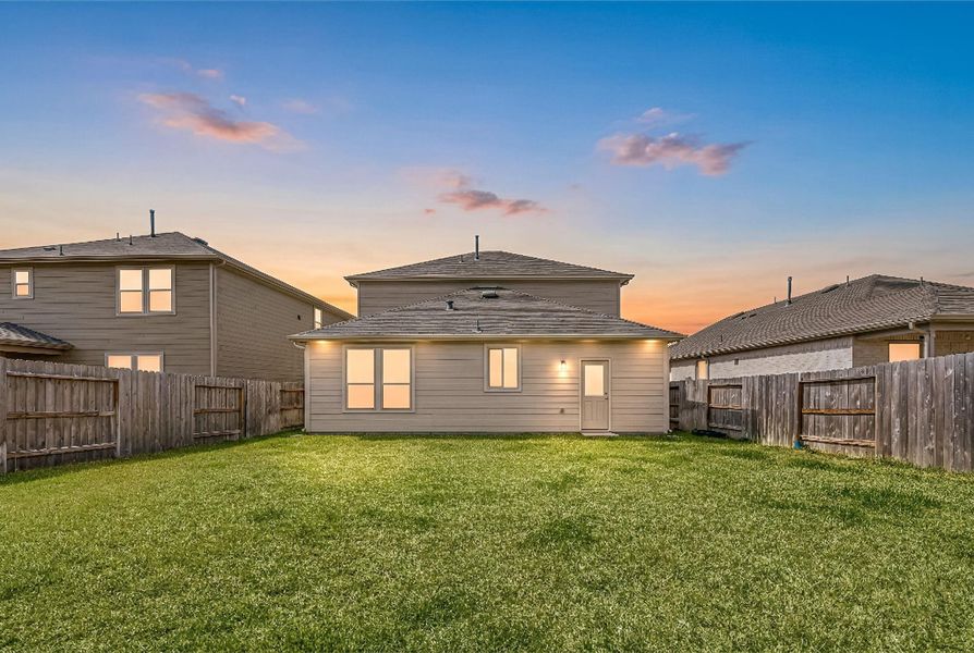 Exterior details and patio area of a home in Mavera, Conroe (Image 29).