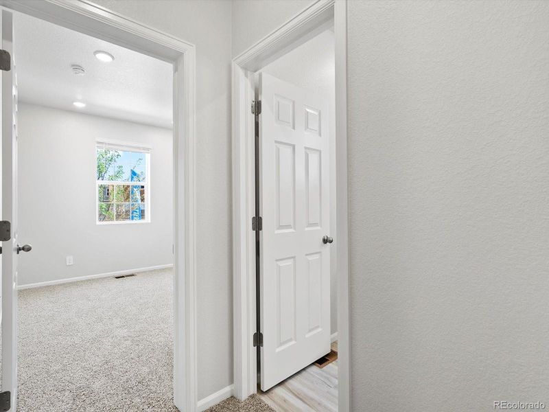 Spacious, unfurnished interior of a new home in Ridgeline Vista: The Canyon Collection, Brighton (Image 27).