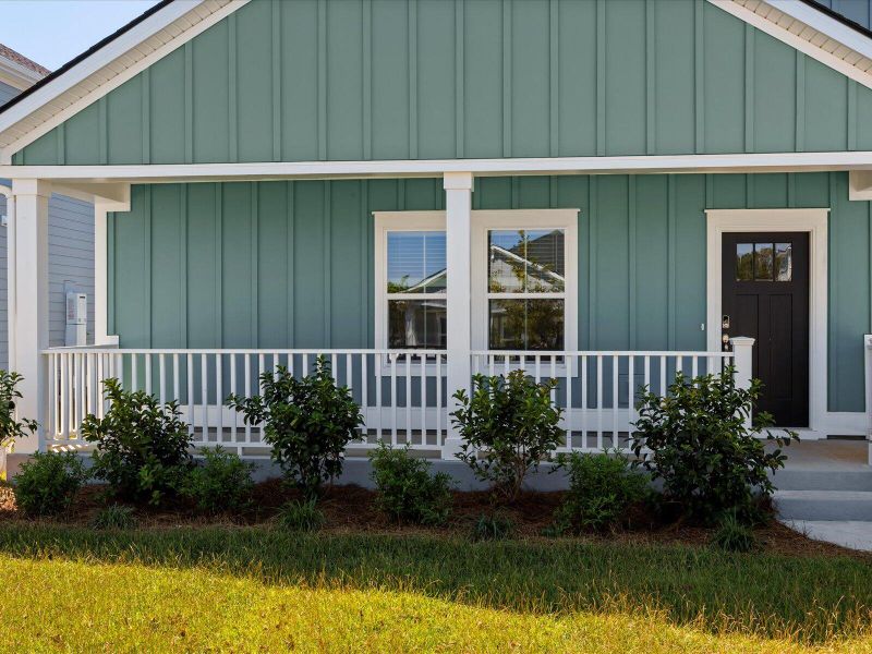 Exterior details and patio area of a home in The Coves at Lakes of Cane Bay II, Summerville (Image 4).