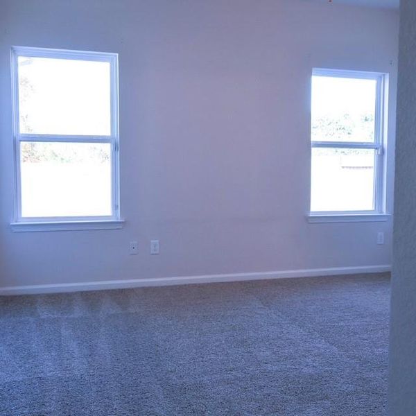 Spacious, unfurnished interior of a new home in Jones Creek Reserve, Richmond (Image 11).