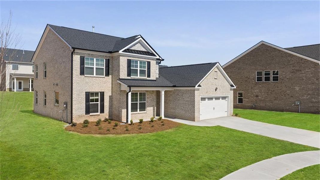 Front exterior of a new home in Water Oak Estates, Lawrenceville, GA, highlighting curb appeal (Image 2).