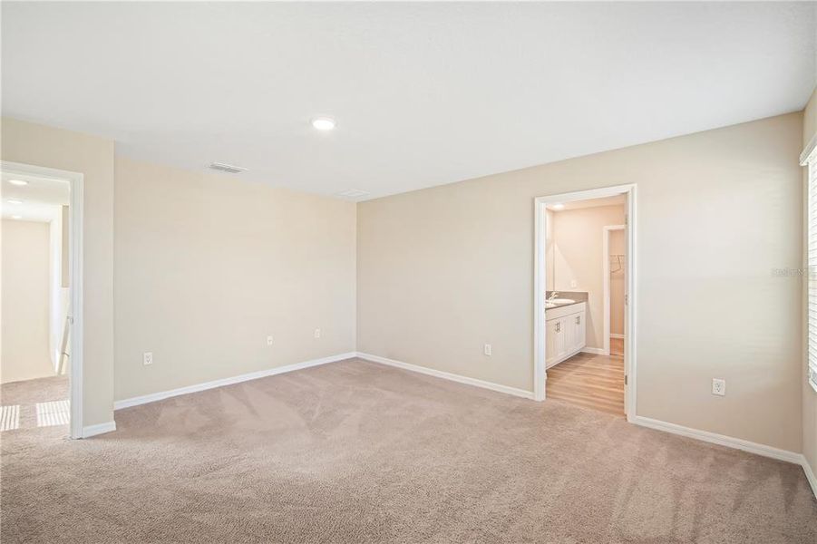 Spacious, unfurnished interior of a new home in Crosswind Point, Parrish (Image 24). Spacious, unfurnished interior of a new home in Crosswind Point, Parrish (Image 24).