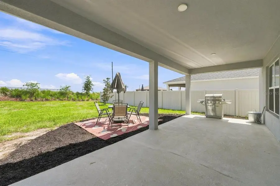 Exterior details and patio area of a home in , Davenport (Image 3).