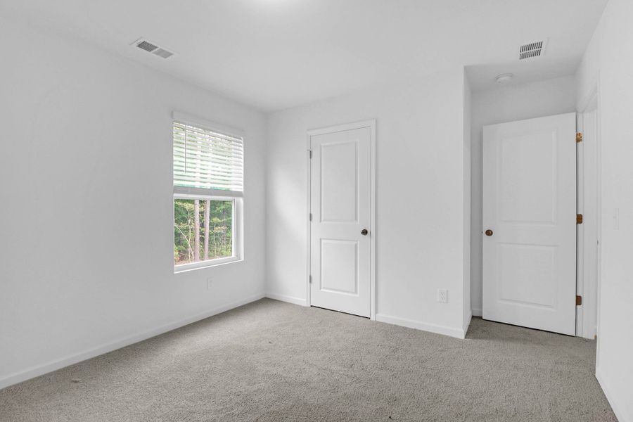 Representative unfurnished interior of a home built from the Lido by True Homes in Autumn Ridge, High Shoals (Image 12).
