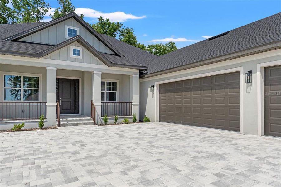 Front exterior of a new home in Southern Hills Plantation, Brooksville, FL, highlighting curb appeal (Image 22). Front exterior of a new home in Southern Hills Plantation, Brooksville, FL, highlighting curb appeal (Image 22).