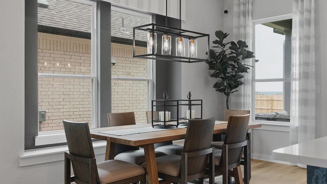 Representative furnished interior of a home built from the Wilson by Chesmar Homes in Lariat, Liberty Hill (Image 12).