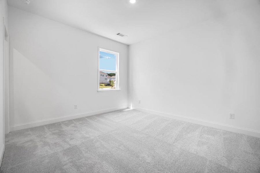 Spacious, unfurnished interior of a new home in Bailey Fence, Dacula (Image 33).