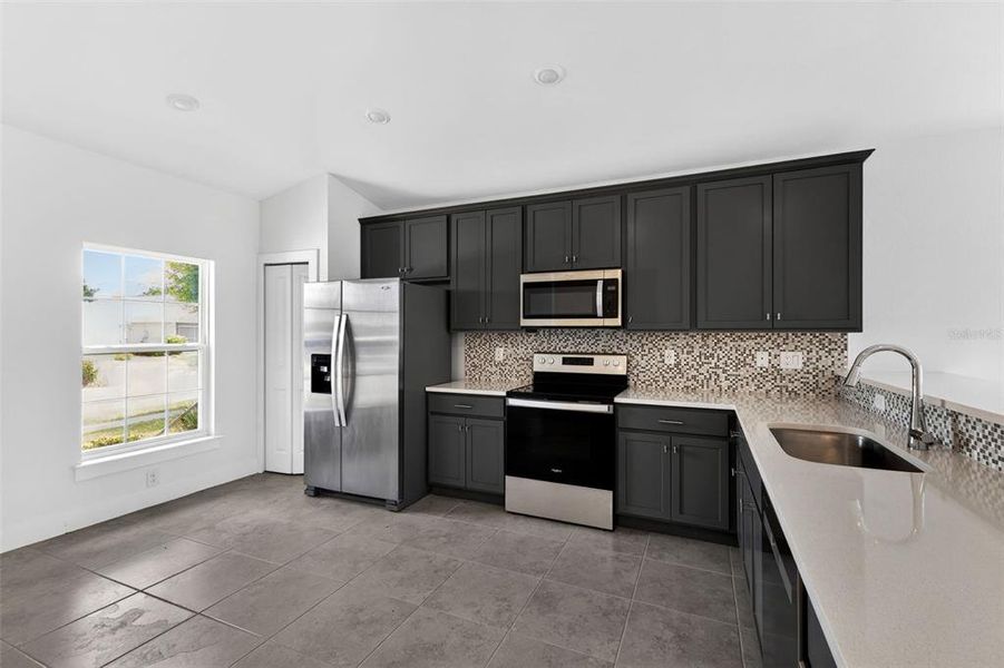 Furnished interior view inside a new home in , Port Charlotte (Image 13).