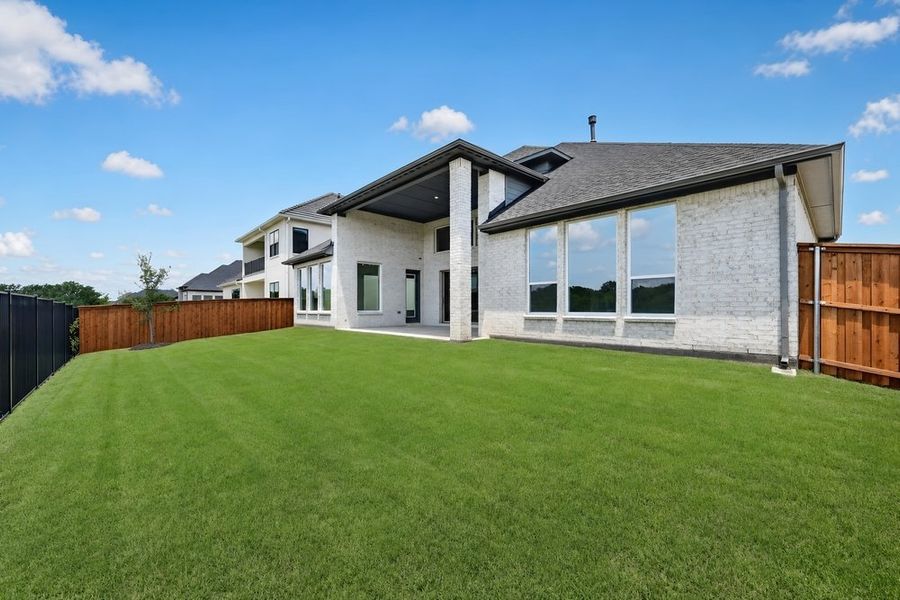 Exterior details and patio area of a home in The Ranch at Uptown Celina, Celina (Image 3).